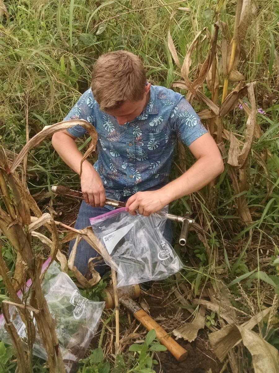 Steven Doyle, collecting soil samples