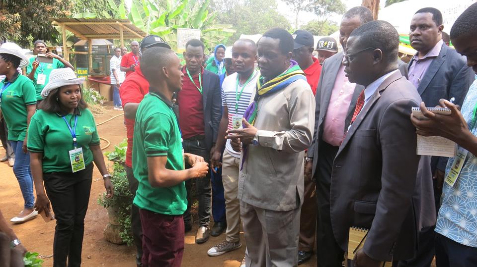 GoH Minister of Industries, Trade and Investiment Hon. Charles Mwijage at our stall #NaneNane2018 together with our own Prof. @RChibunda 